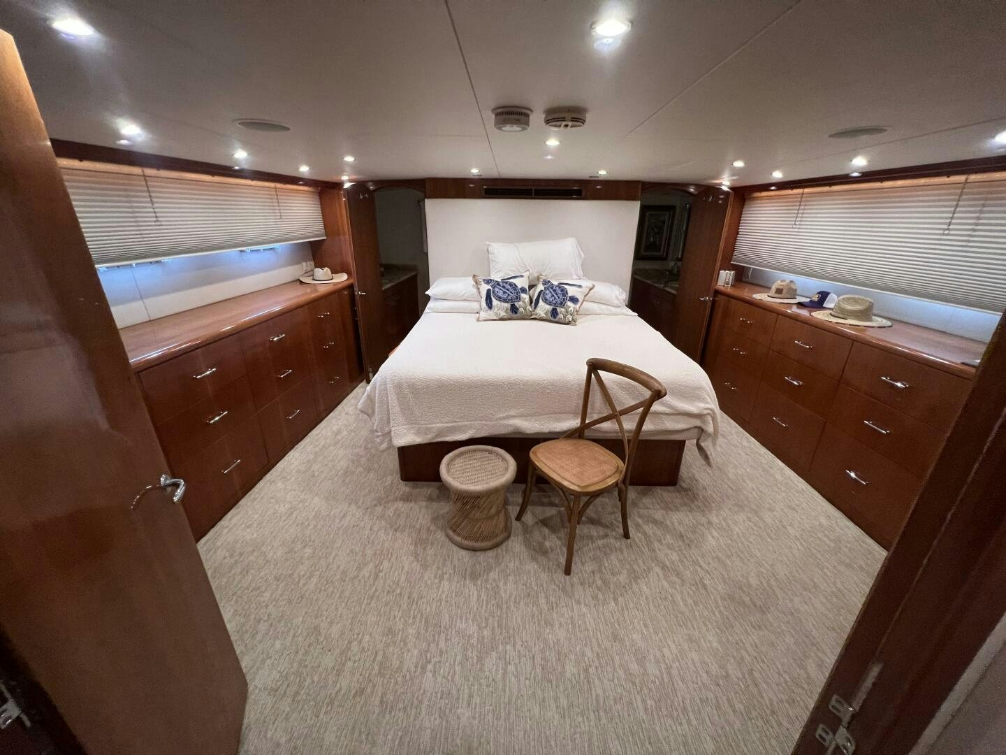 a bedroom with a bed and a desk aboard BAYOU A BUD Yacht for Sale