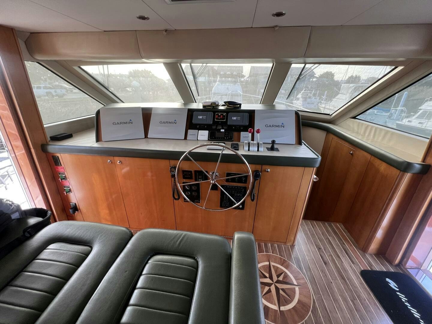 inside of a vehicle with a table and chairs and a bench aboard BAYOU A BUD Yacht for Sale