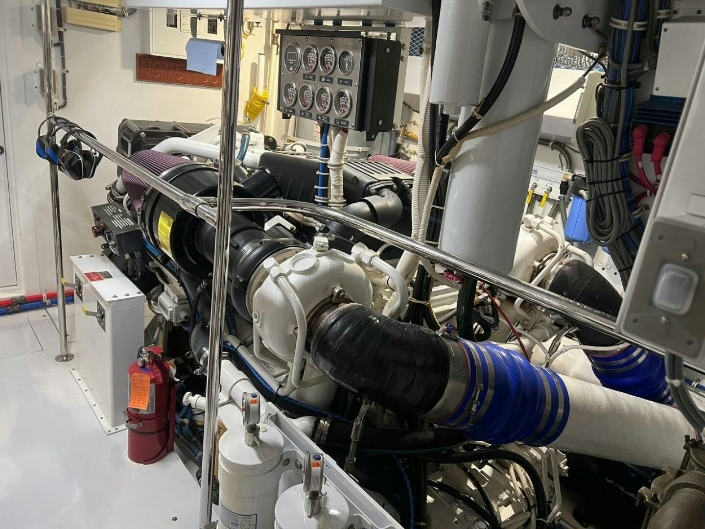 a person working on a machine aboard BAYOU A BUD Yacht for Sale