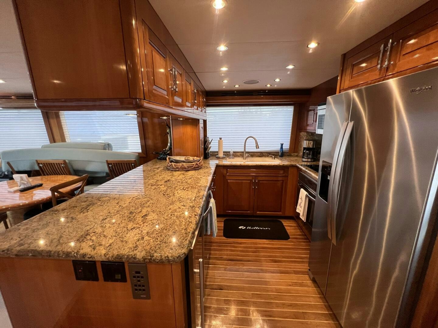 a kitchen with a large island aboard BAYOU A BUD Yacht for Sale