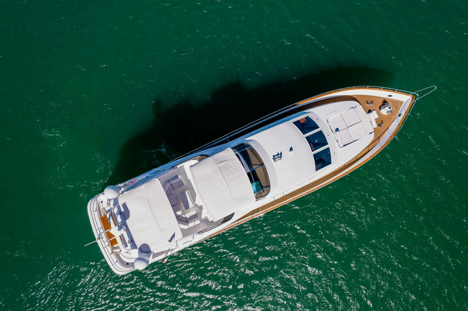 a small boat in the water aboard PURA VIDA  Yacht for Sale