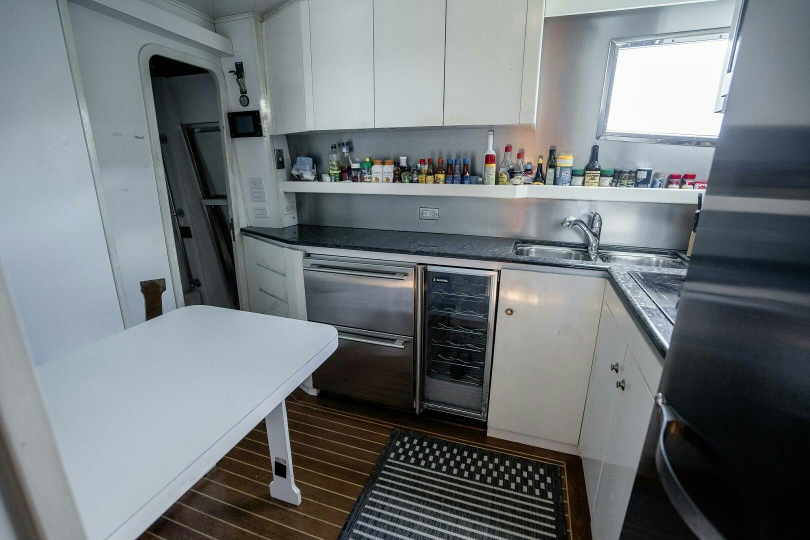 a kitchen with a large oven aboard PURA VIDA  Yacht for Sale