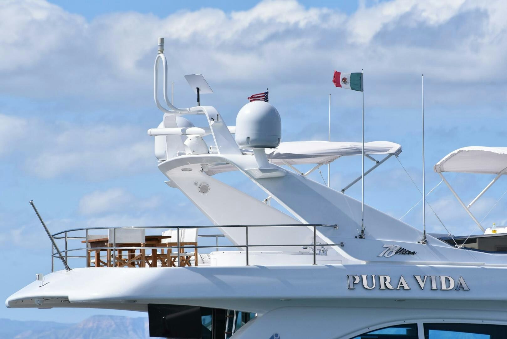 a large white boat aboard PURA VIDA  Yacht for Sale