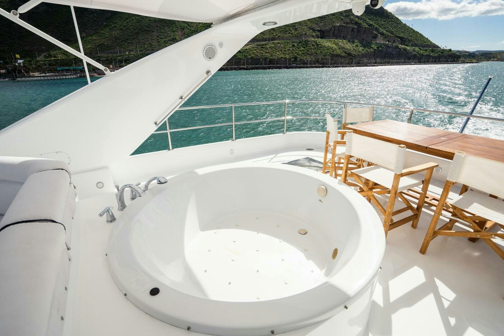a bathtub in a swimming pool aboard PURA VIDA  Yacht for Sale