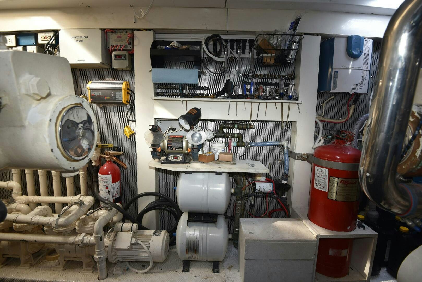 a room with machinery and equipment aboard PURA VIDA  Yacht for Sale