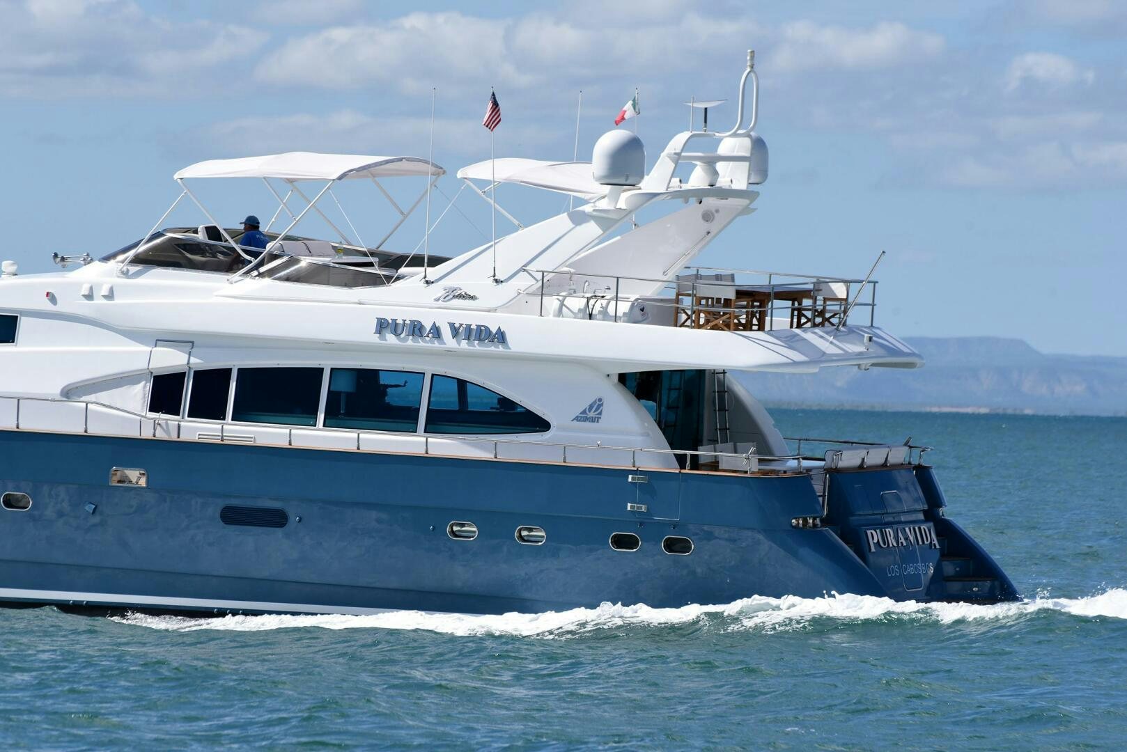 a boat on the water aboard PURA VIDA  Yacht for Sale