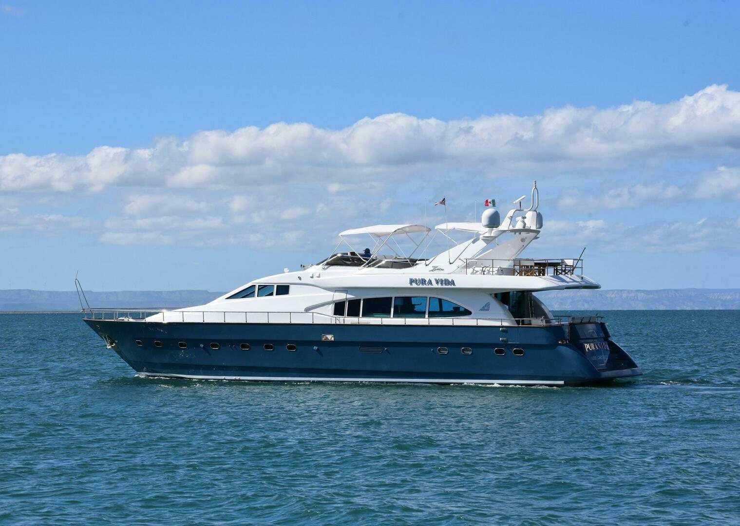 a boat in the water aboard PURA VIDA  Yacht for Sale