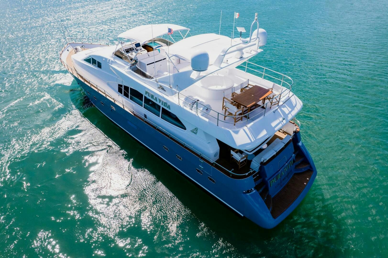 a boat on the water aboard PURA VIDA  Yacht for Sale