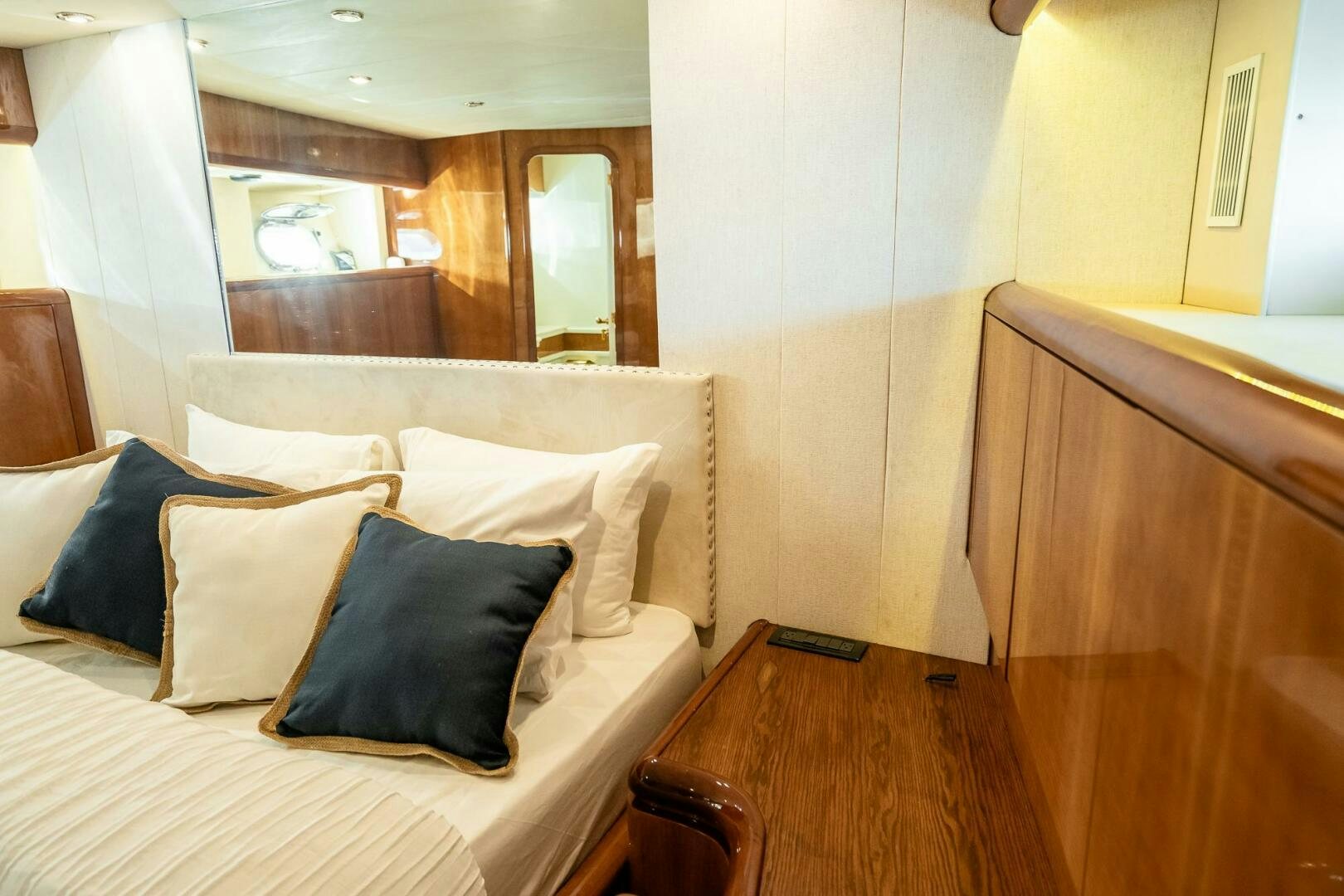 a bed with pillows aboard PURA VIDA  Yacht for Sale