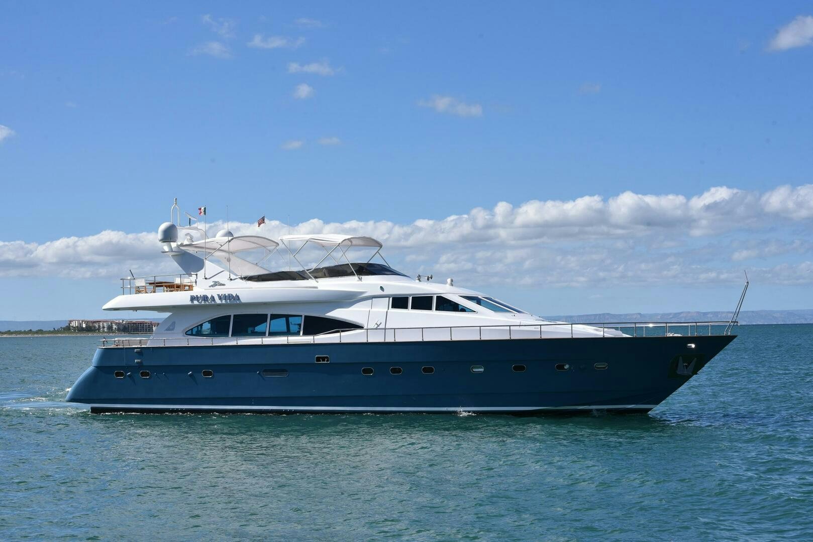 a boat on the water aboard PURA VIDA  Yacht for Sale