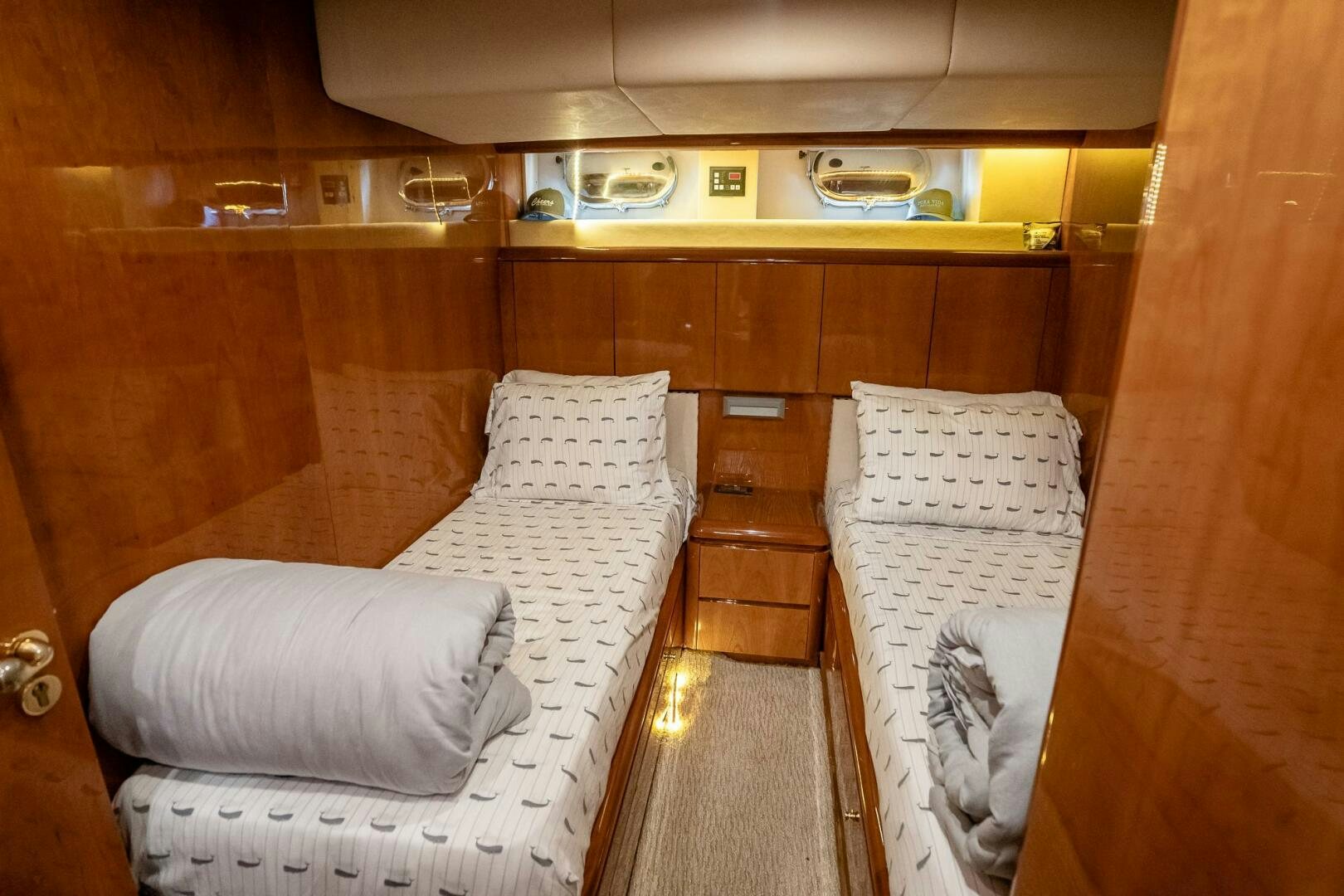 a couple of beds in a room aboard PURA VIDA  Yacht for Sale