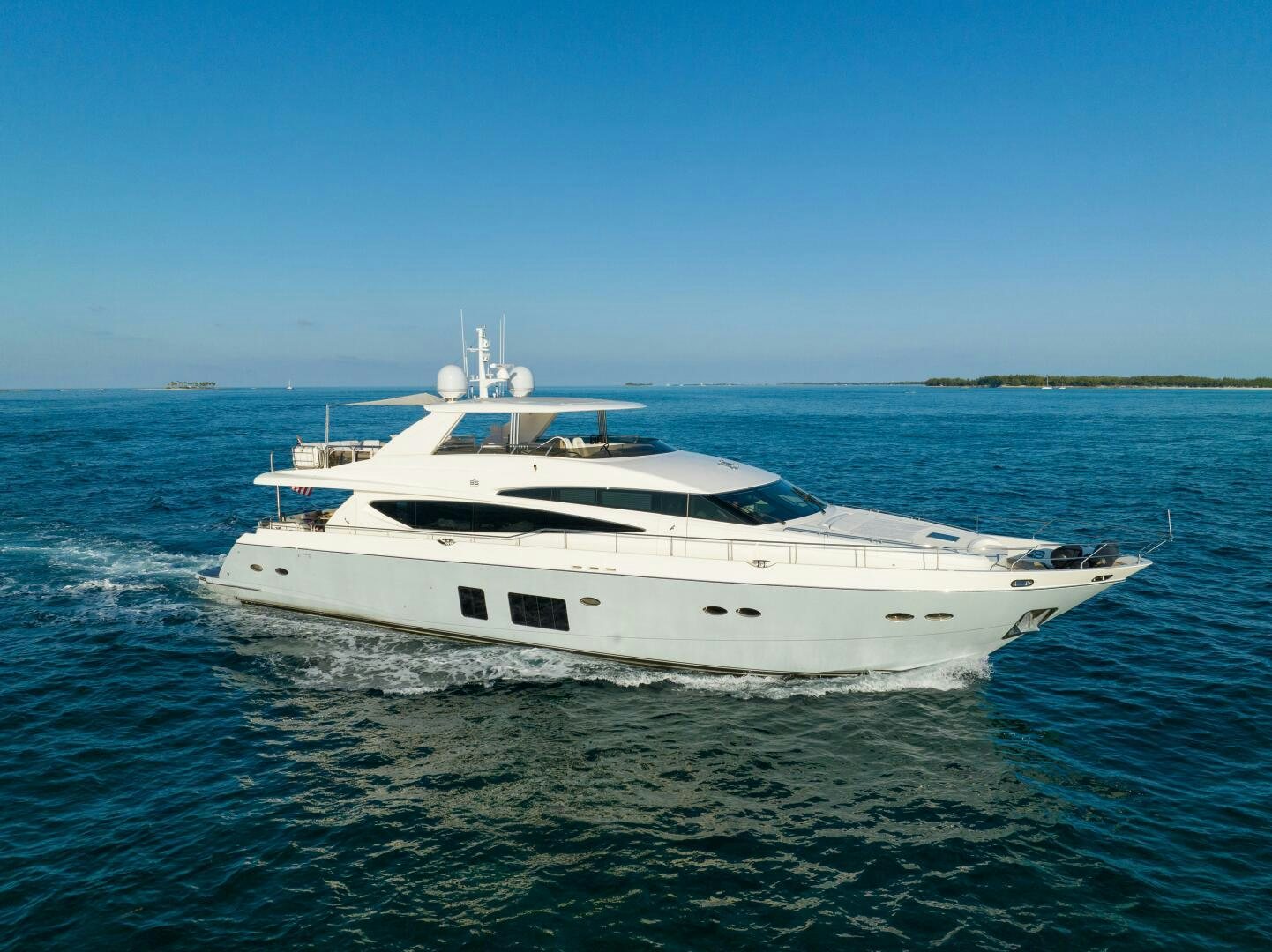 a white yacht on the water aboard CURRENT SEA Yacht for Sale