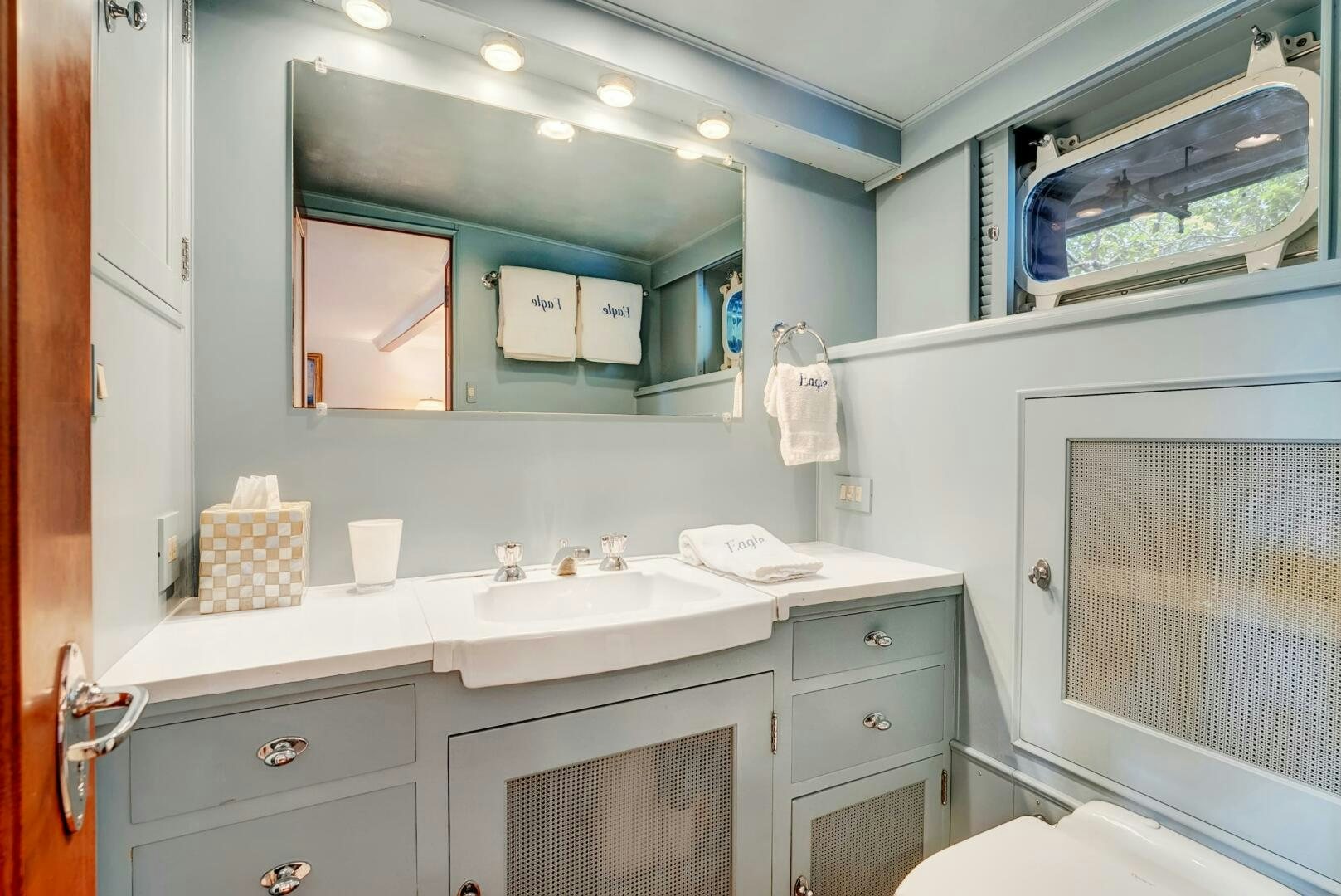 a bathroom with a sink and a mirror aboard EAGLE Yacht for Sale