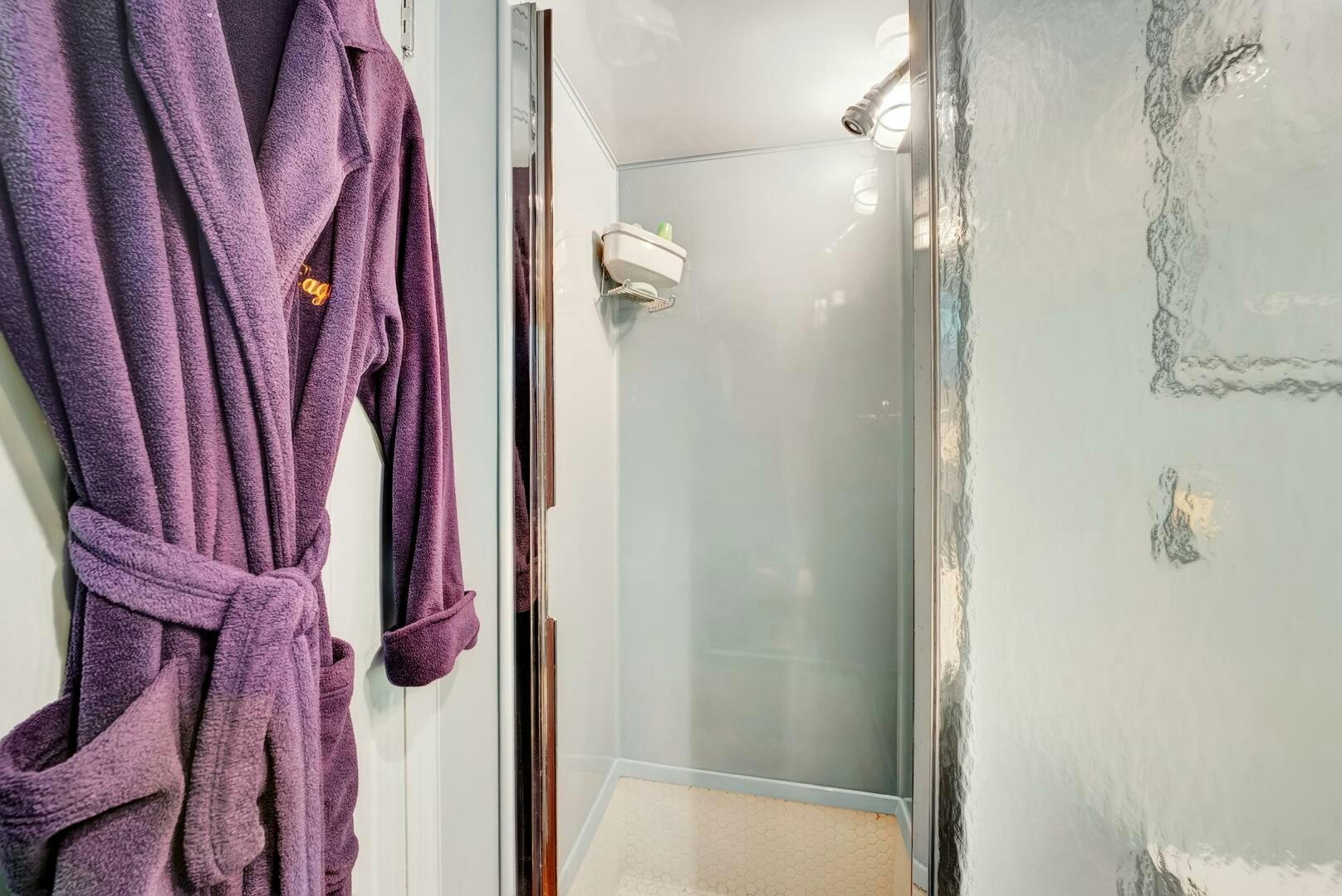 a purple towel on a door aboard EAGLE Yacht for Sale