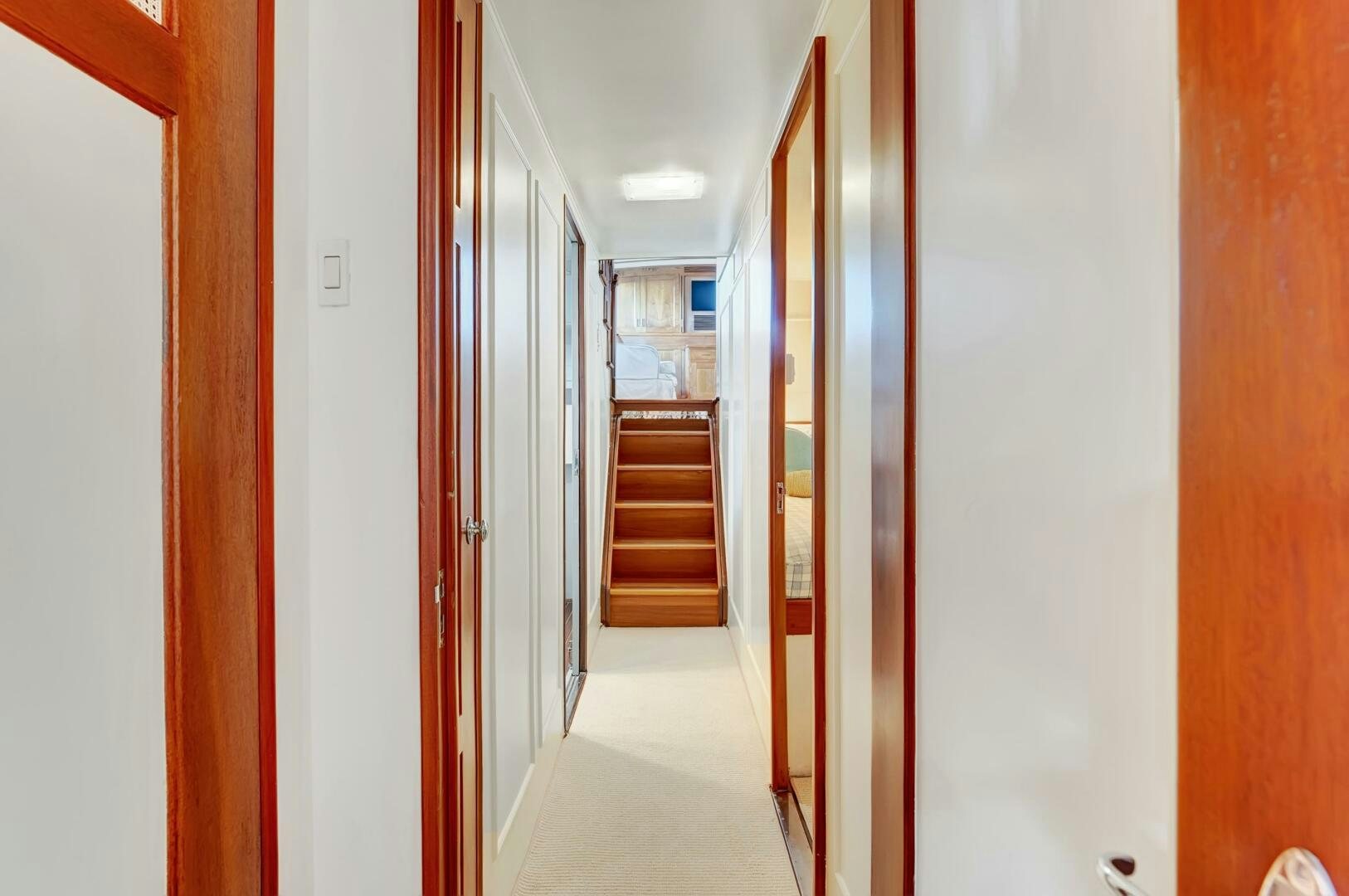a hallway with doors aboard EAGLE Yacht for Sale