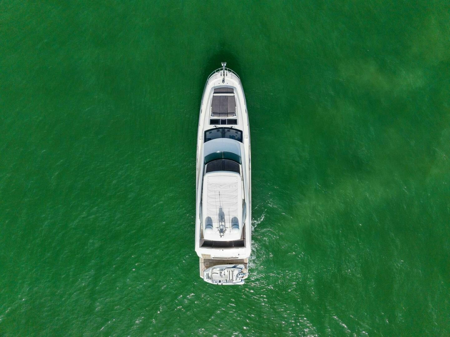 a white and black boat in the water aboard PRESTIGE WORLDWIDE Yacht for Sale
