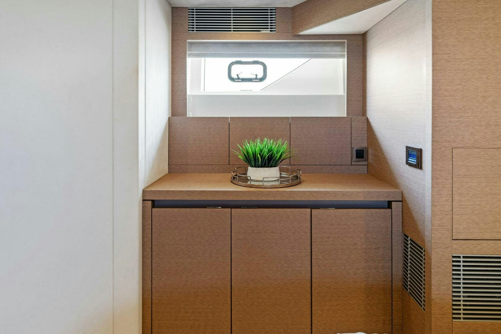 a plant on a counter aboard PRESTIGE WORLDWIDE Yacht for Sale