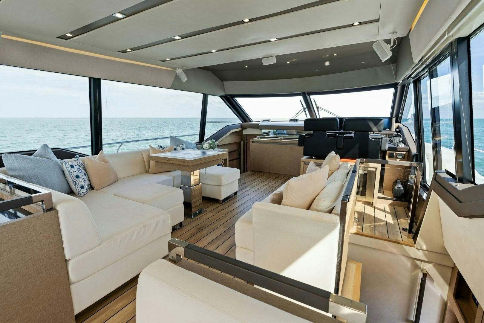 a boat with a table and chairs aboard PRESTIGE WORLDWIDE Yacht for Sale