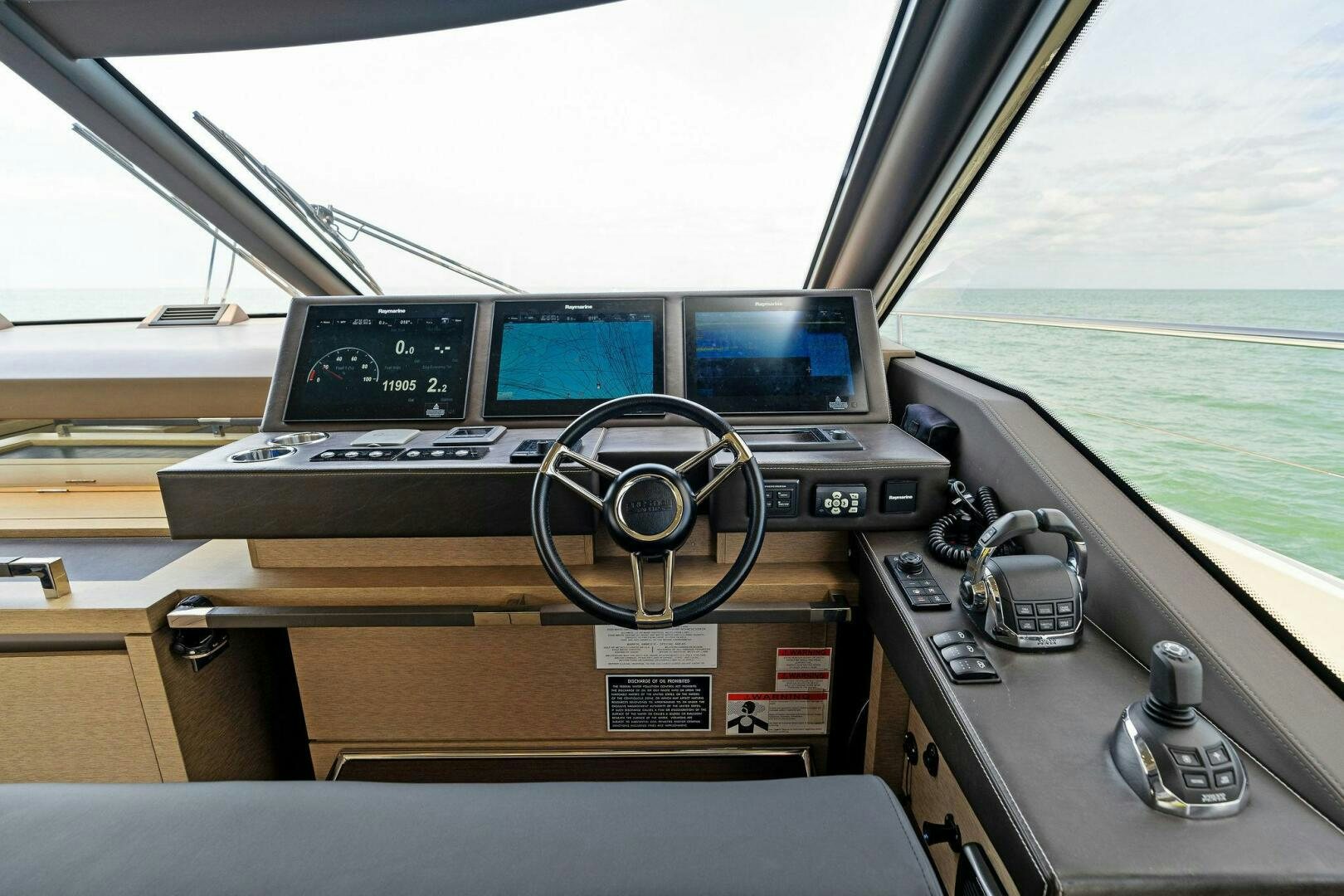 inside of a car aboard PRESTIGE WORLDWIDE Yacht for Sale