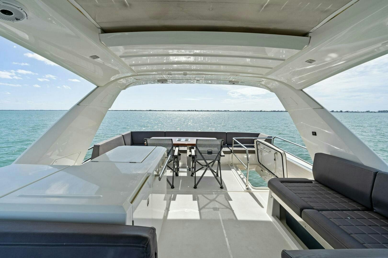 a boat on the water aboard PRESTIGE WORLDWIDE Yacht for Sale