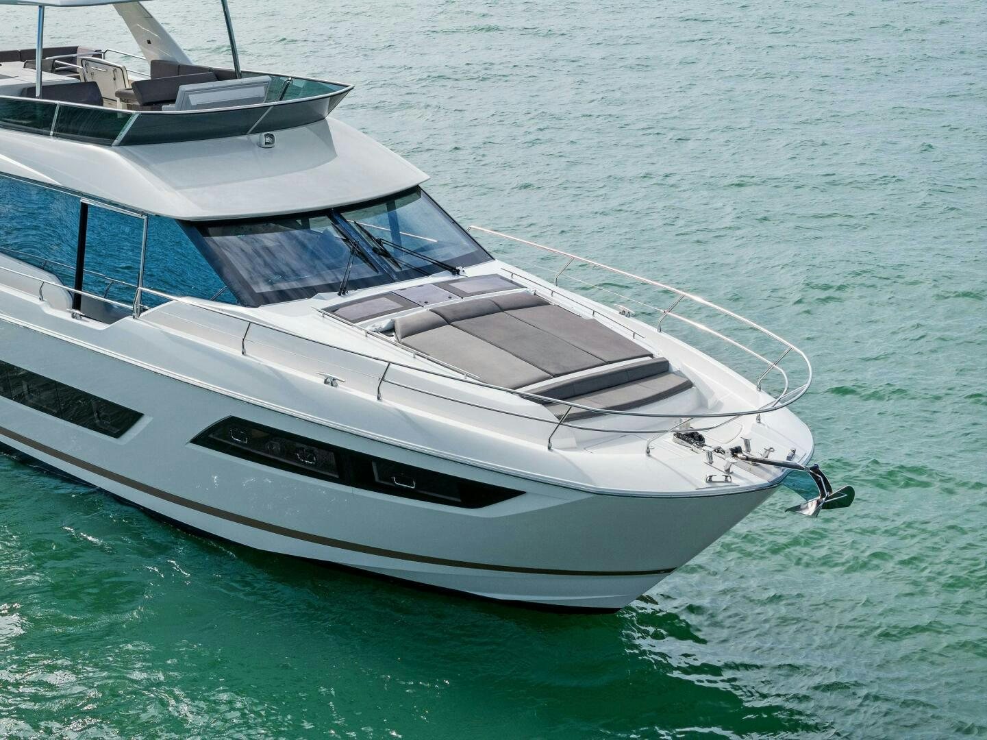 a white boat on the water aboard PRESTIGE WORLDWIDE Yacht for Sale