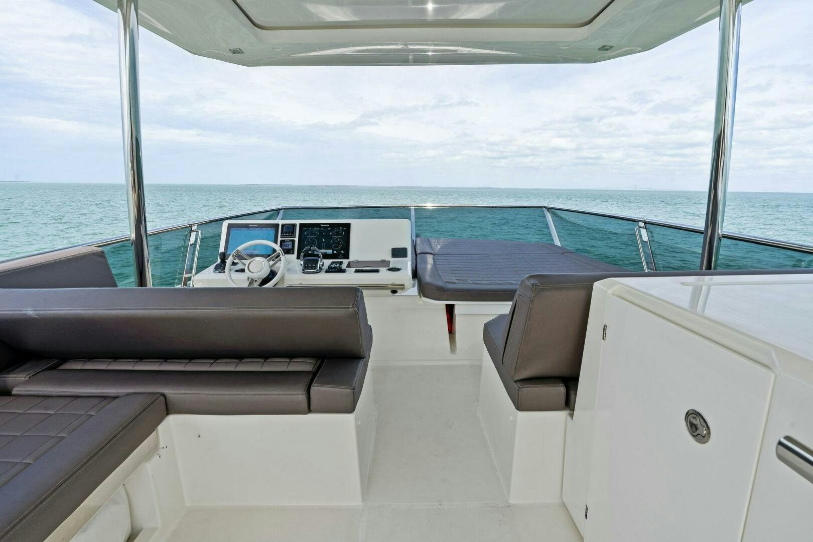 a boat on the water aboard PRESTIGE WORLDWIDE Yacht for Sale