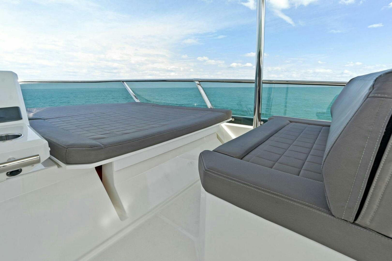 a boat on the water aboard PRESTIGE WORLDWIDE Yacht for Sale