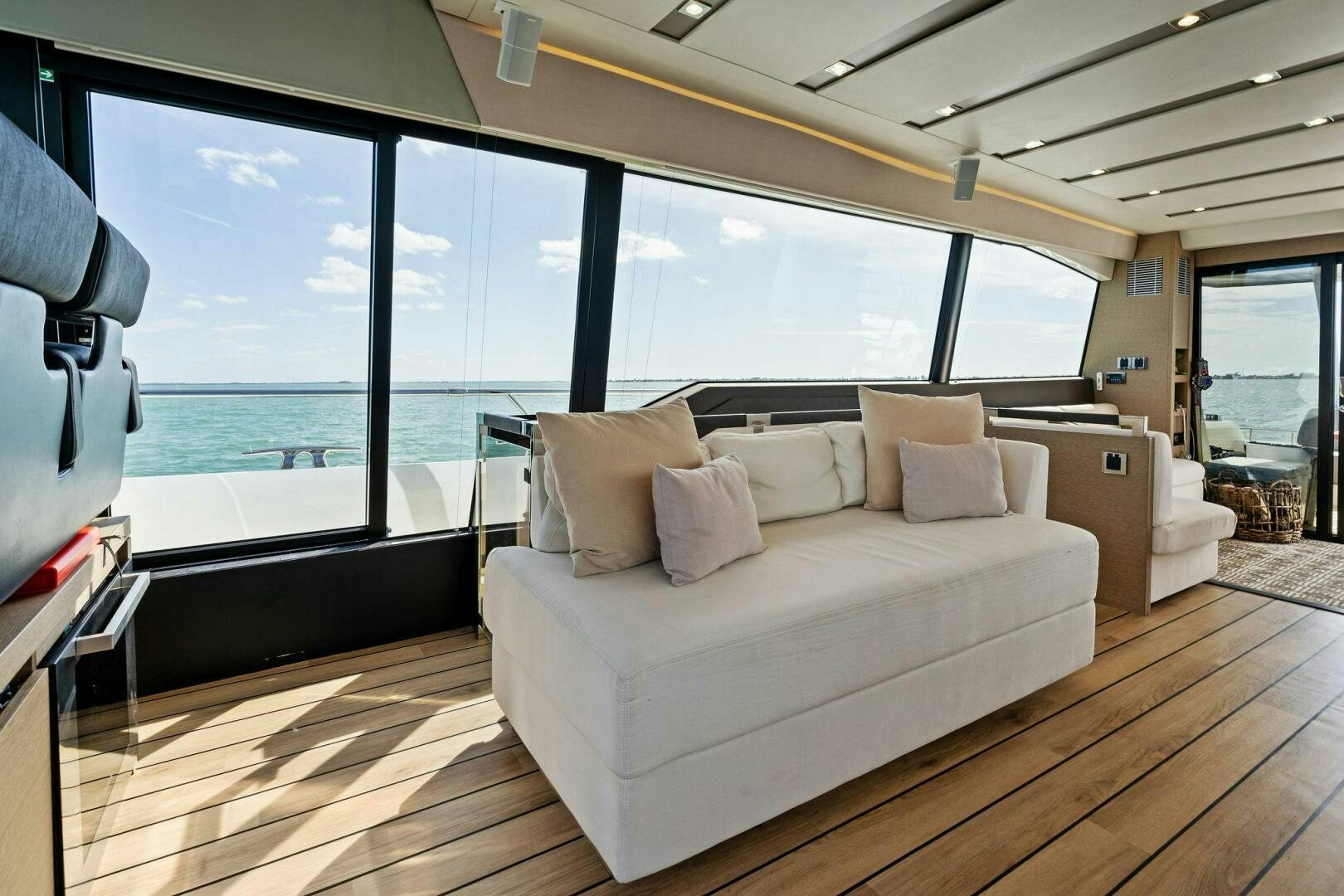 a large bed in a room aboard PRESTIGE WORLDWIDE Yacht for Sale