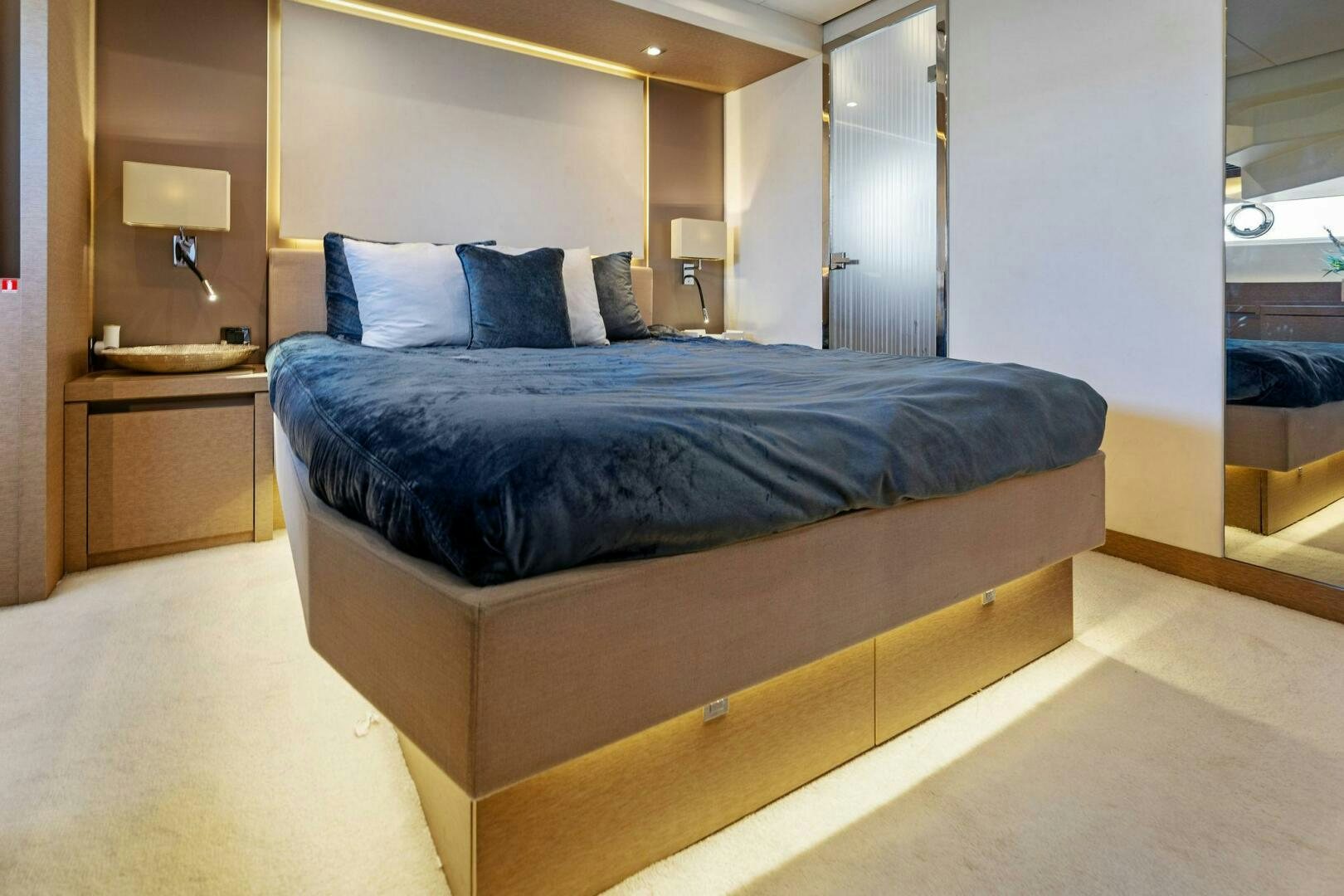 a bed in a room aboard PRESTIGE WORLDWIDE Yacht for Sale