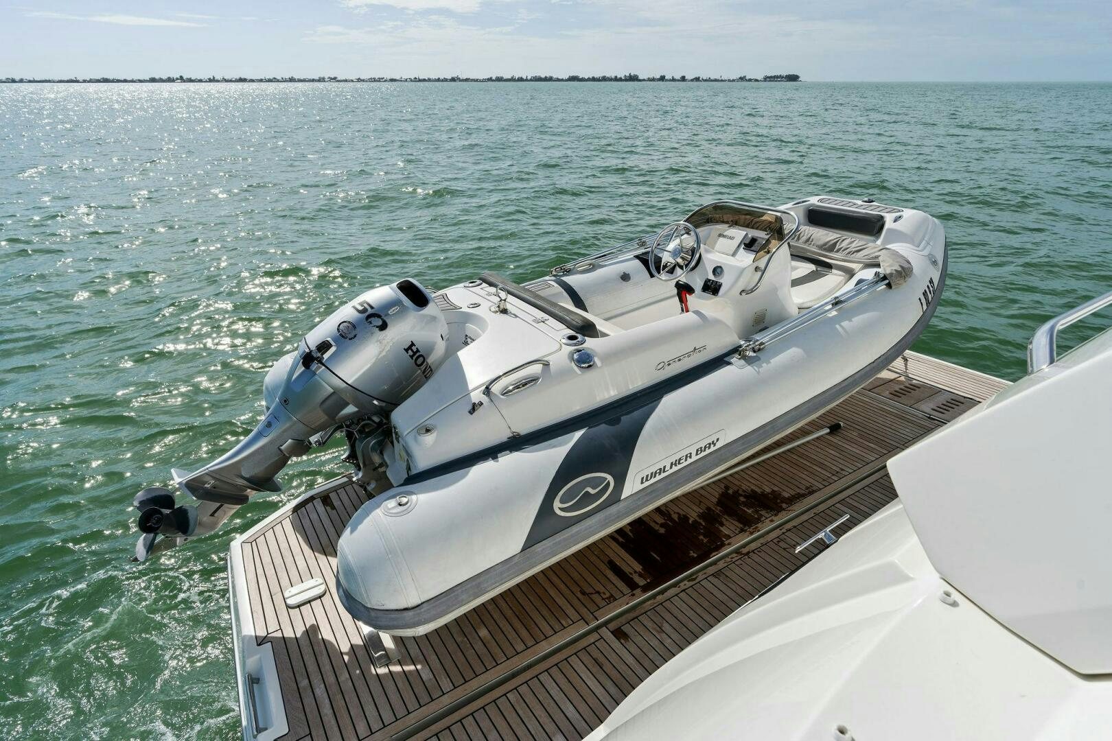a military boat on the water aboard PRESTIGE WORLDWIDE Yacht for Sale