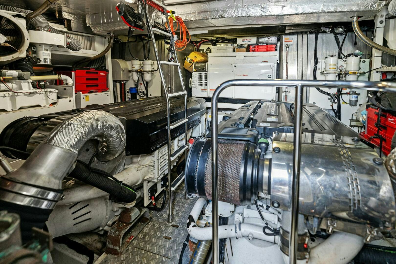 a large machine with a large metal pipe aboard PRESTIGE WORLDWIDE Yacht for Sale