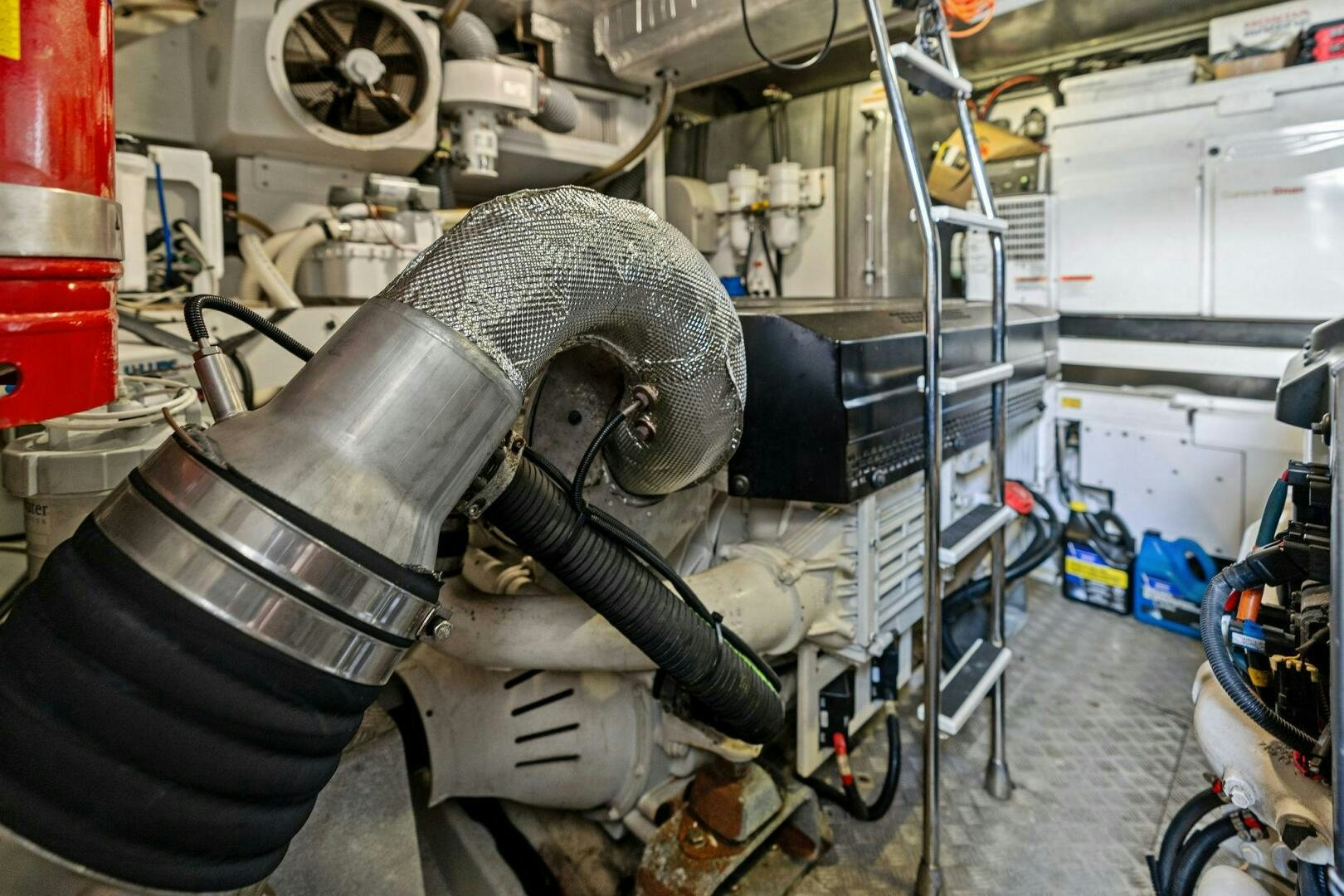 a large grey and black metal object aboard PRESTIGE WORLDWIDE Yacht for Sale