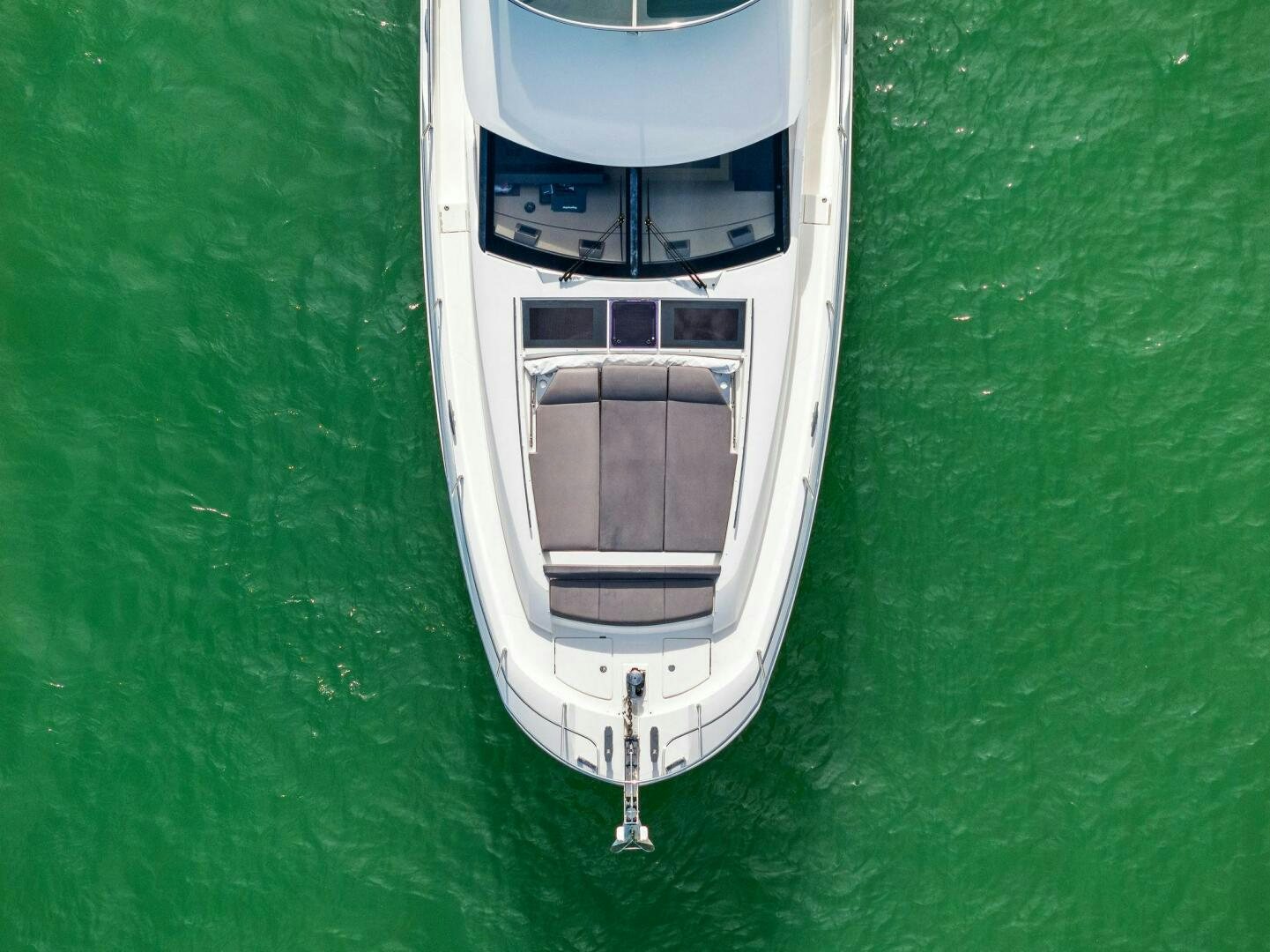 a white car with a black door aboard PRESTIGE WORLDWIDE Yacht for Sale