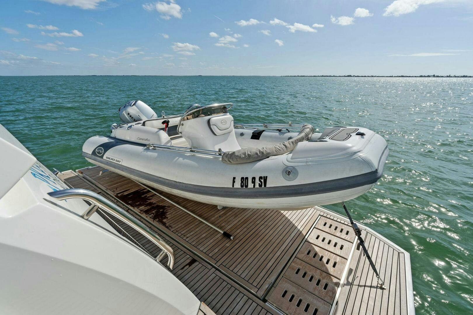 a boat on the water aboard PRESTIGE WORLDWIDE Yacht for Sale