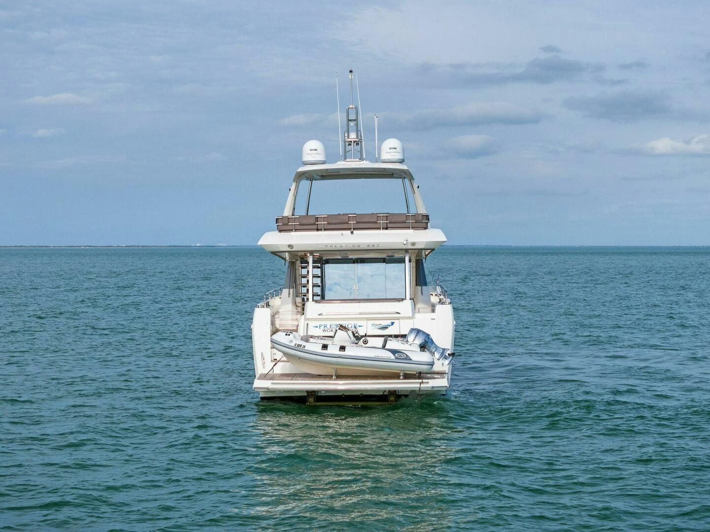 a boat in the water aboard PRESTIGE WORLDWIDE Yacht for Sale