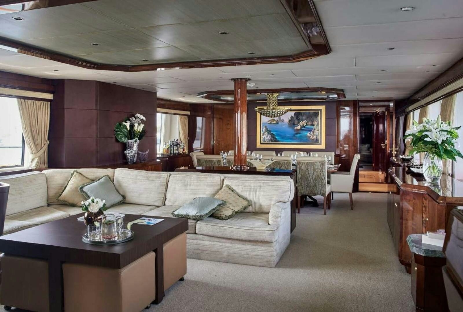 a living room with a couch and a coffee table aboard REARDEN STEEL Yacht for Sale