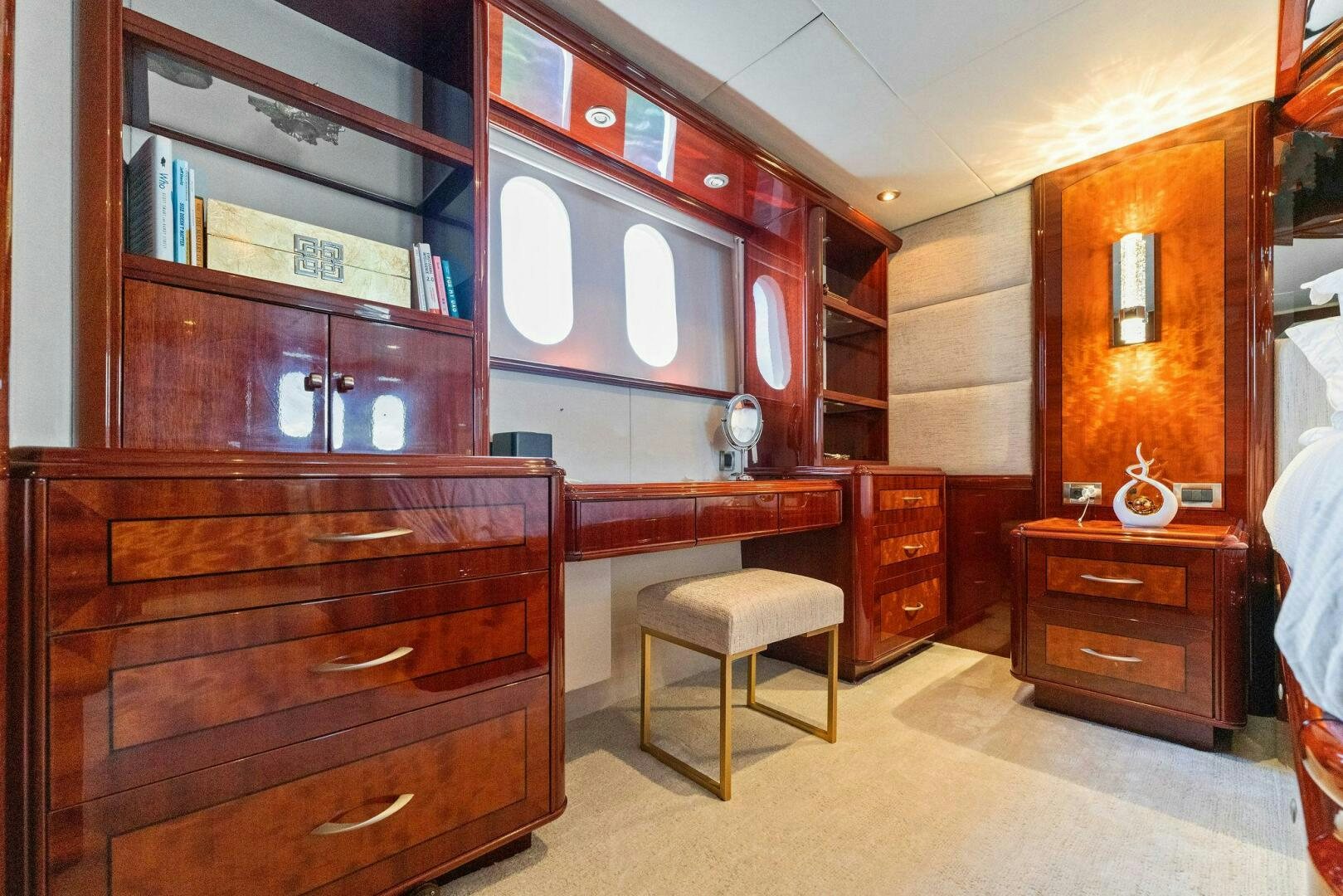 a room with a cabinet and a mirror aboard CORAGGIO Yacht for Sale