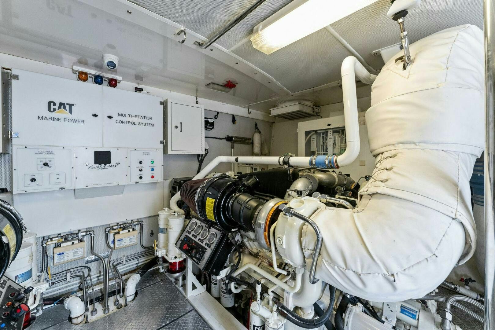 a person in a white coat aboard CORAGGIO Yacht for Sale