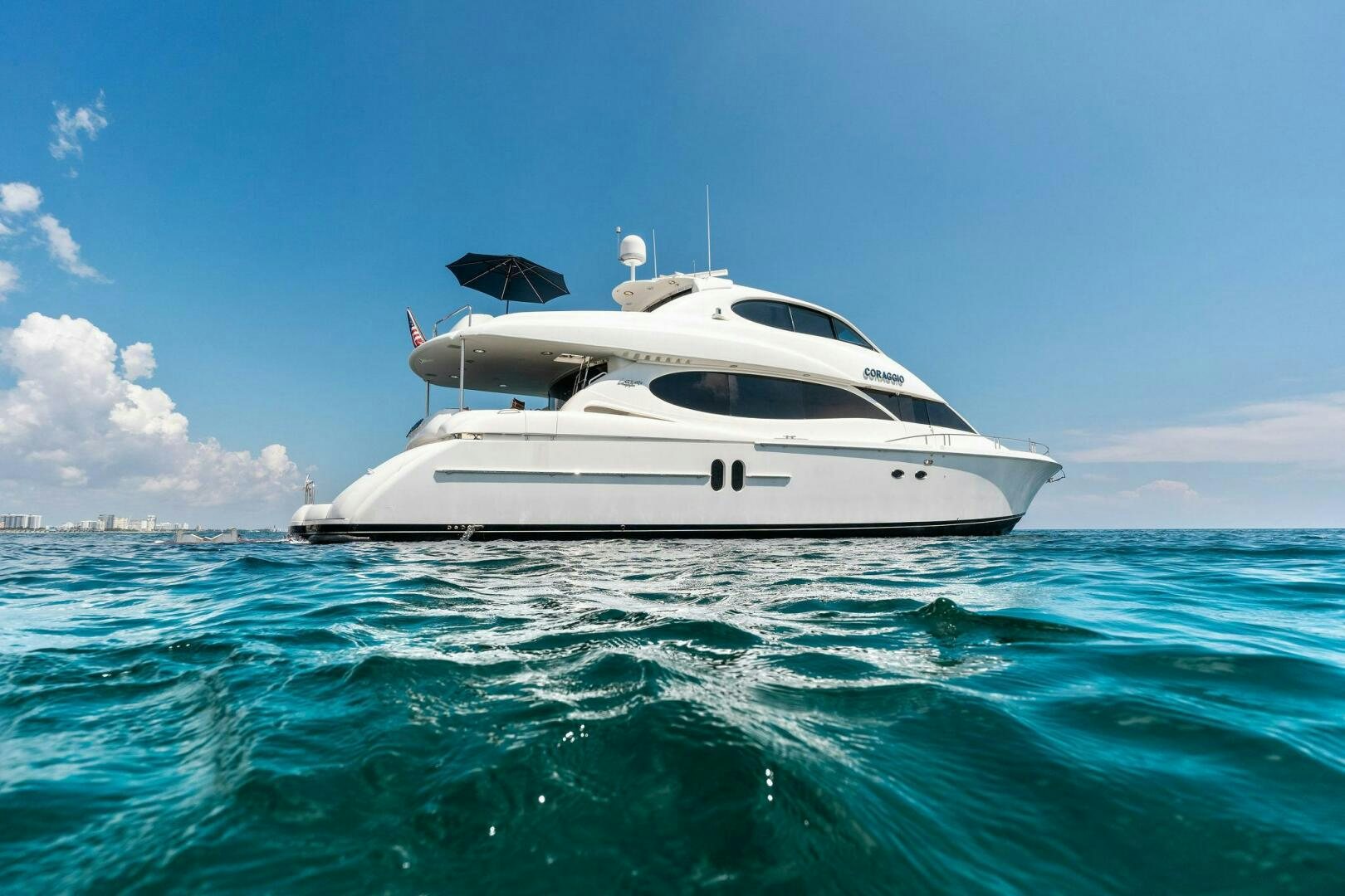 a white yacht in the water aboard CORAGGIO Yacht for Sale