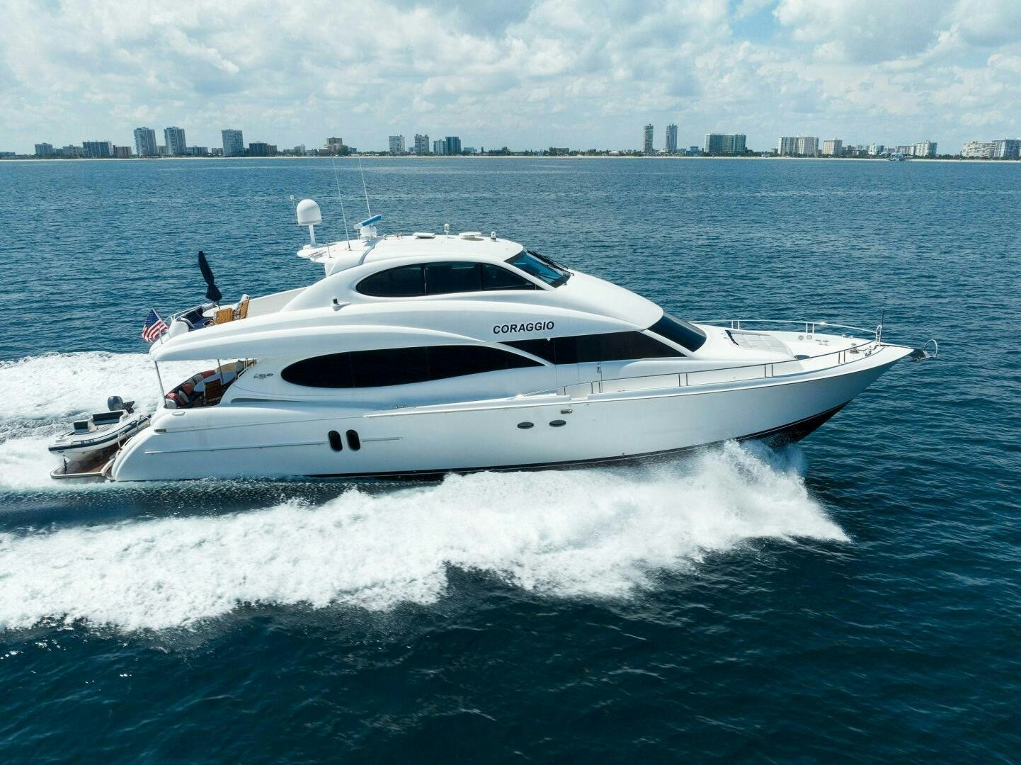 a white yacht on water aboard CORAGGIO Yacht for Sale