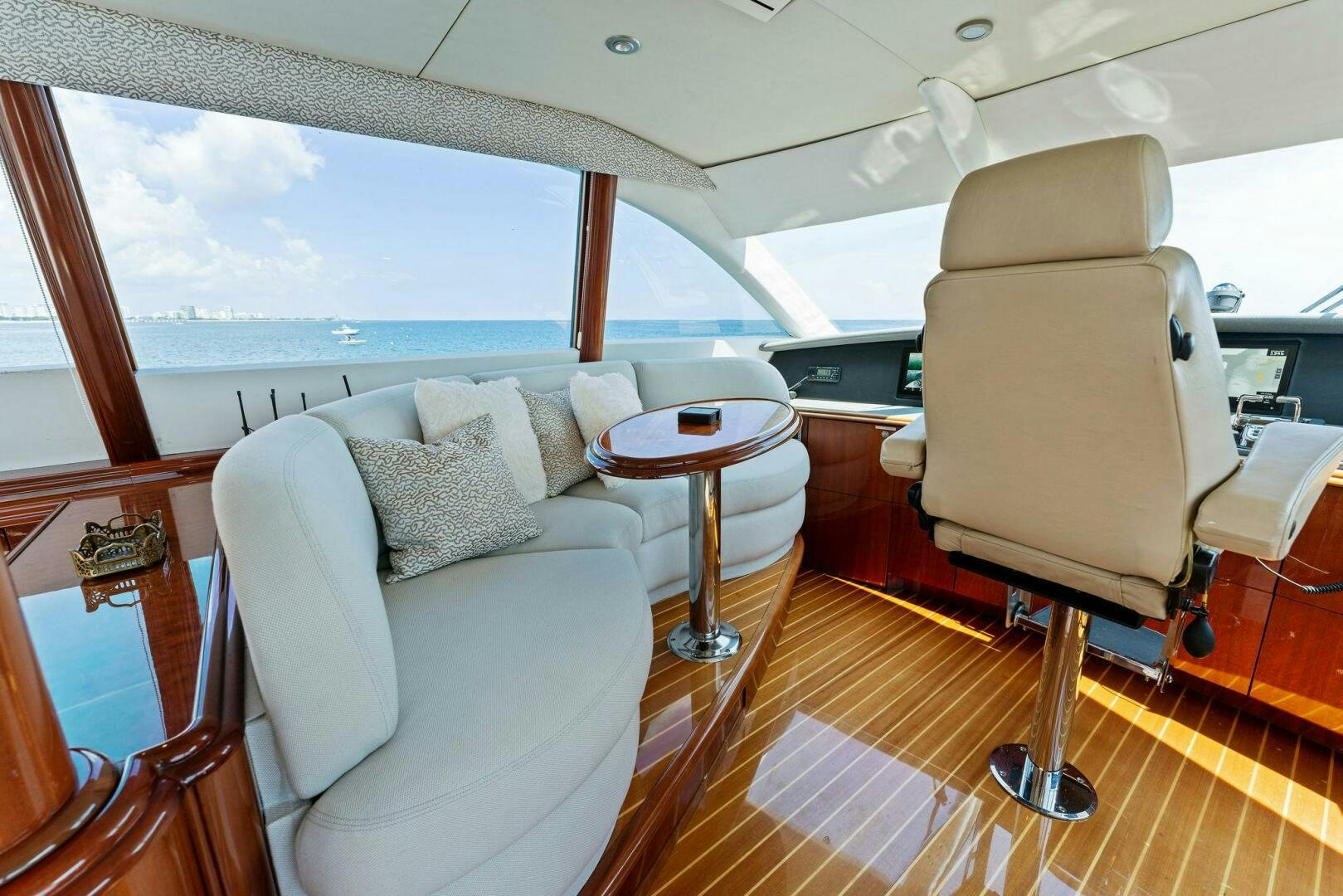 a living room with a large window aboard CORAGGIO Yacht for Sale