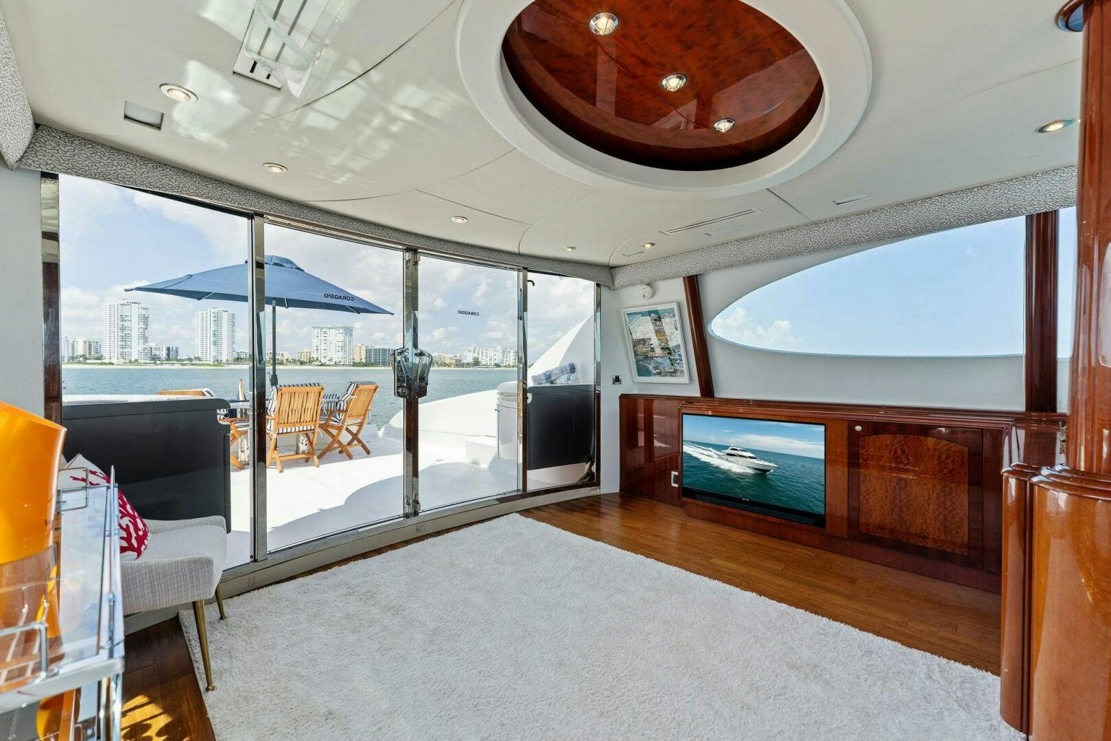 a room with a large glass window aboard CORAGGIO Yacht for Sale