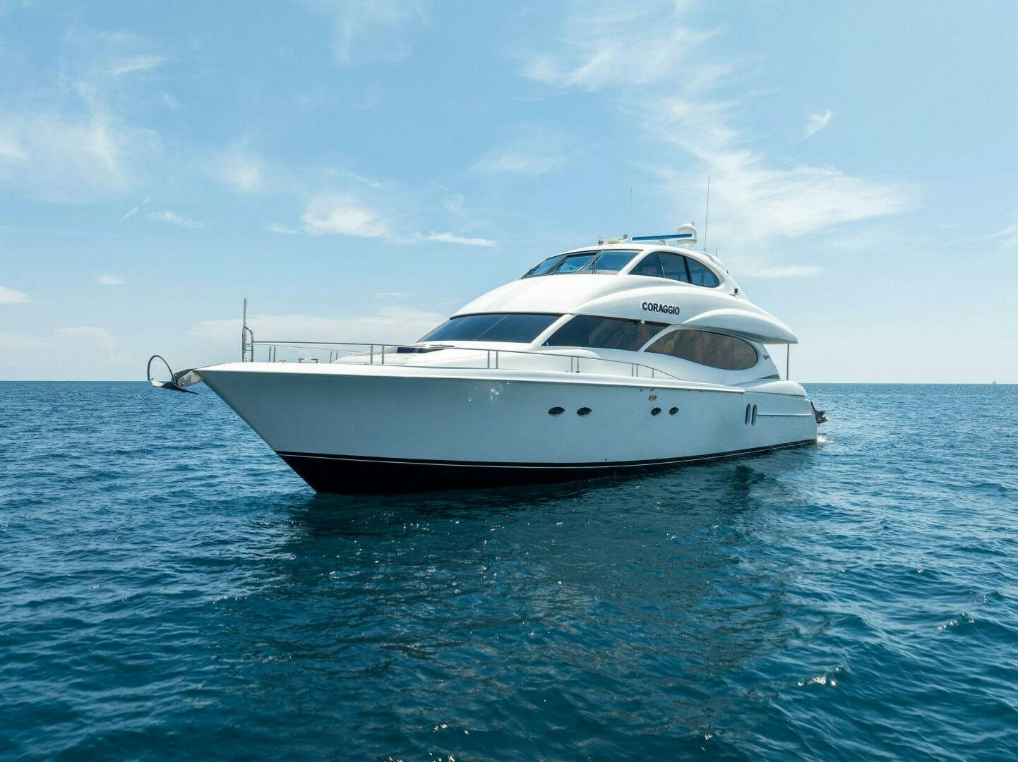 a white yacht in the water aboard CORAGGIO Yacht for Sale