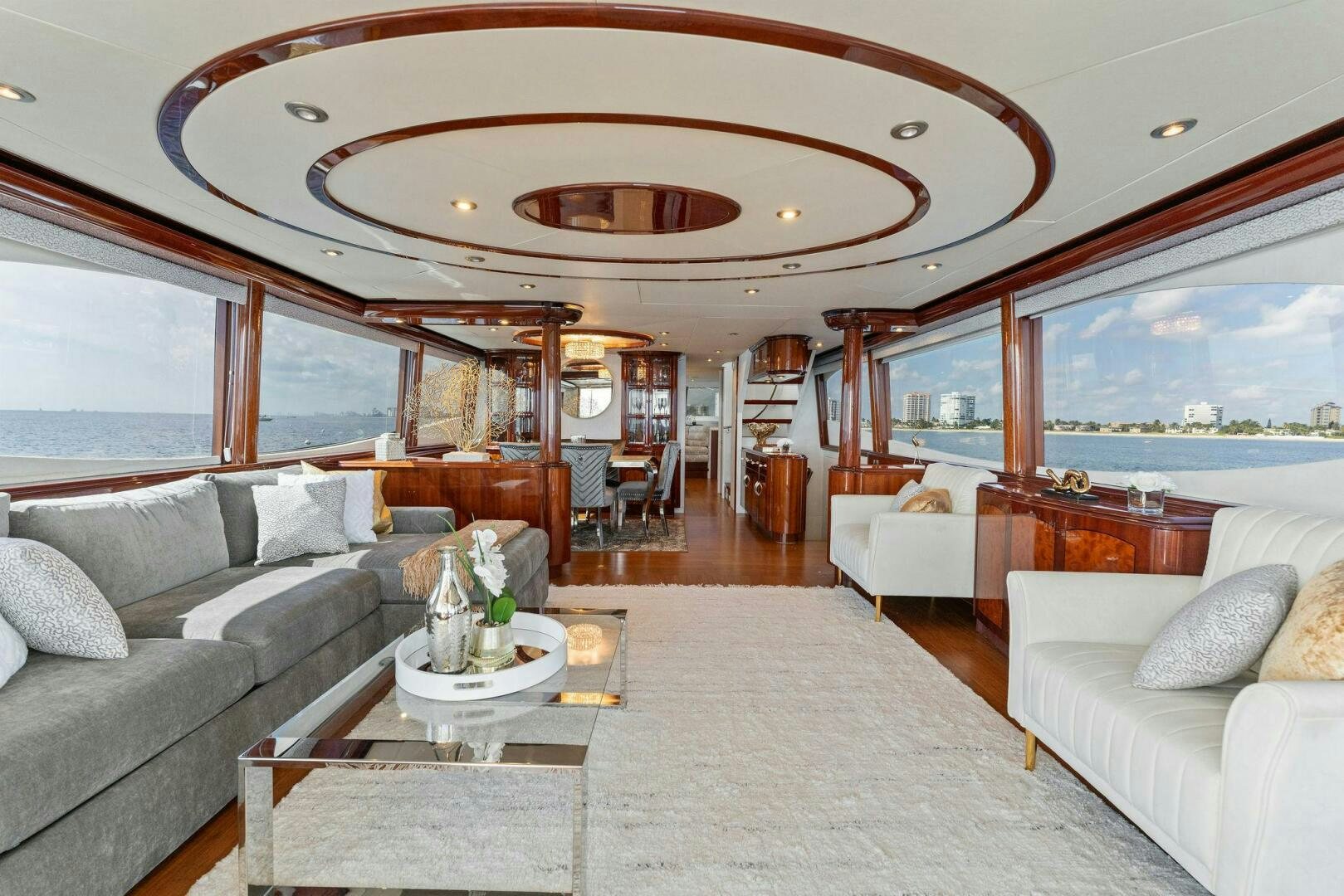 a living room with a large window aboard CORAGGIO Yacht for Sale