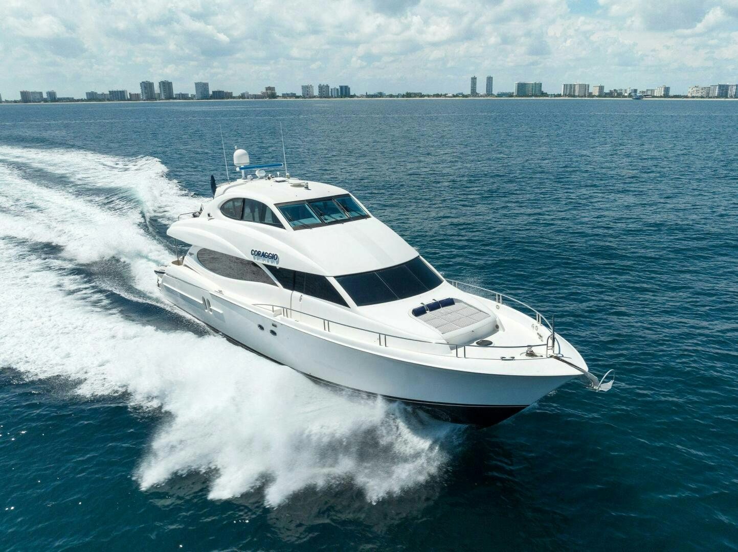 a white yacht on the water aboard CORAGGIO Yacht for Sale