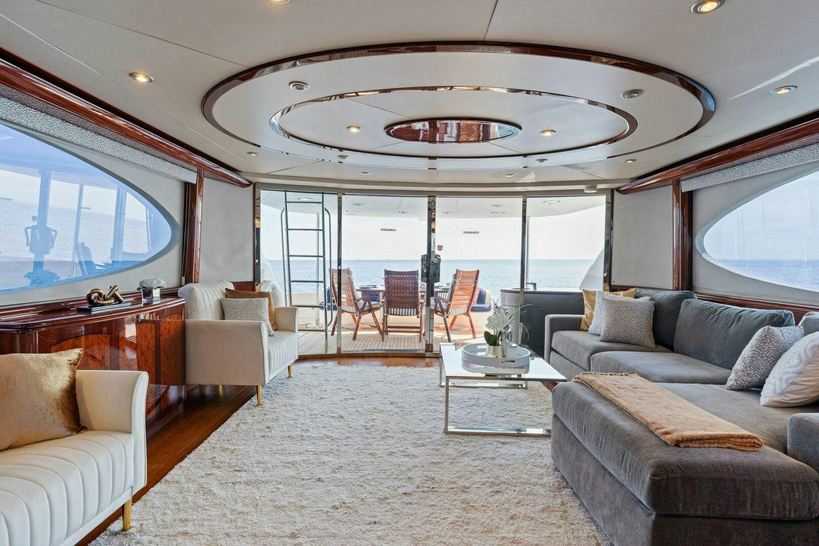 a living room with a large glass ceiling aboard CORAGGIO Yacht for Sale