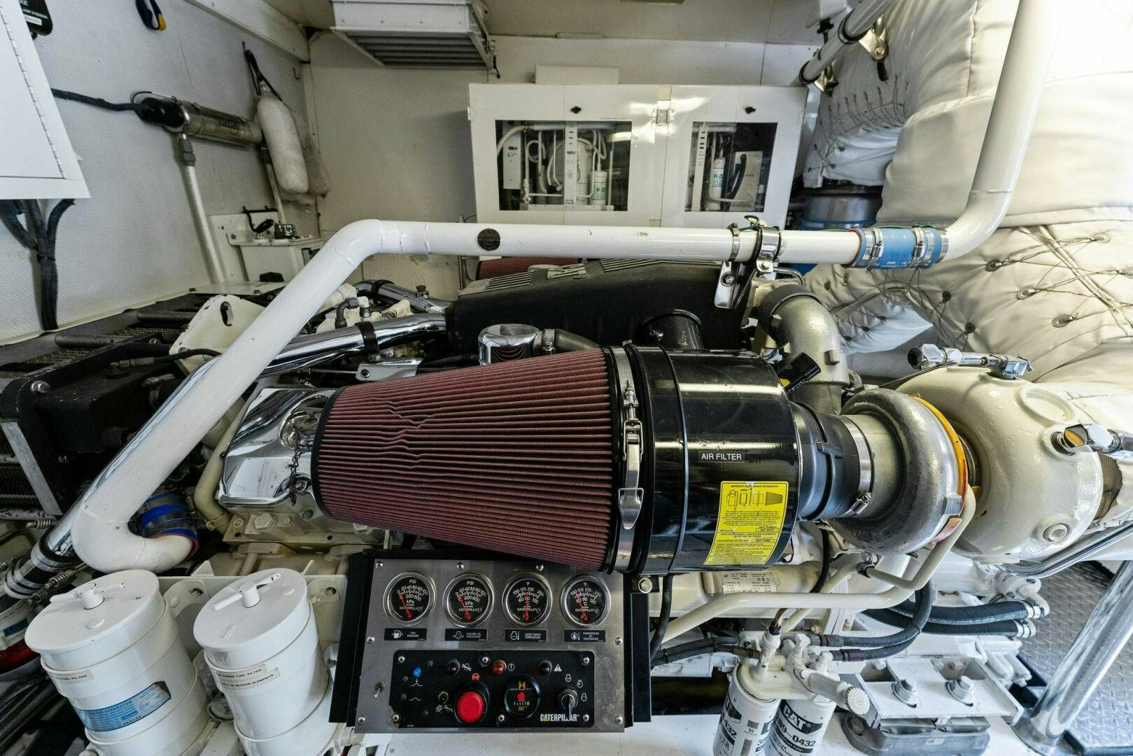 a machine with a red and black cylinder aboard CORAGGIO Yacht for Sale
