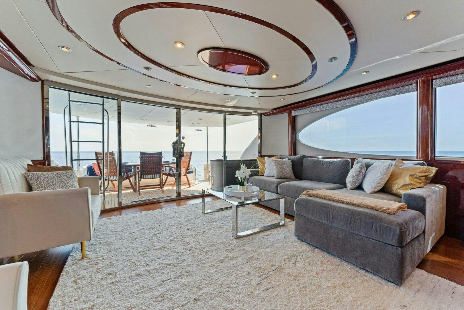a living room with a large glass ceiling aboard CORAGGIO Yacht for Sale