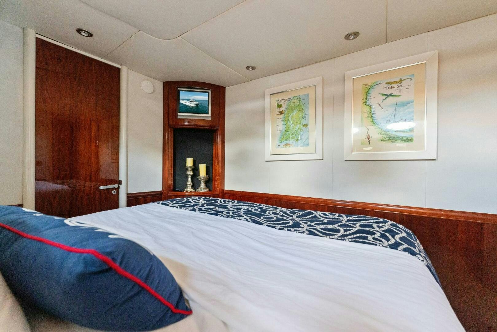 a bed with a white sheet aboard CORAGGIO Yacht for Sale