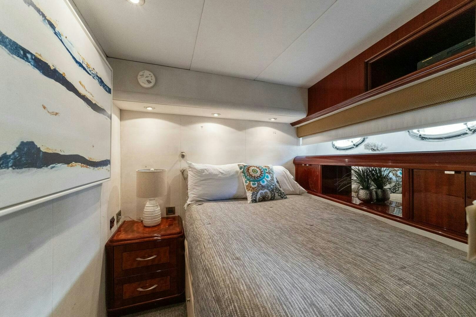 a bed with a large bed aboard CORAGGIO Yacht for Sale